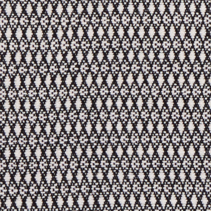 Black & white geometric knit fabric with tiny diamond motifs; fine textured material for apparel or accessories.