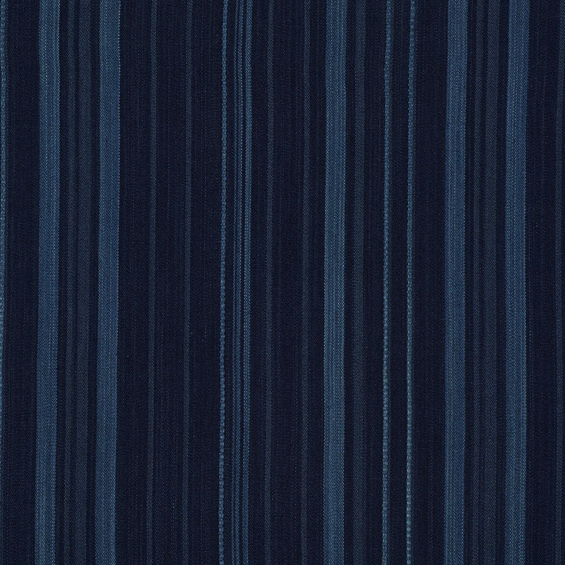 Vertical navy blue stripe fabric with alternating light and dark denim tones; textured textile.