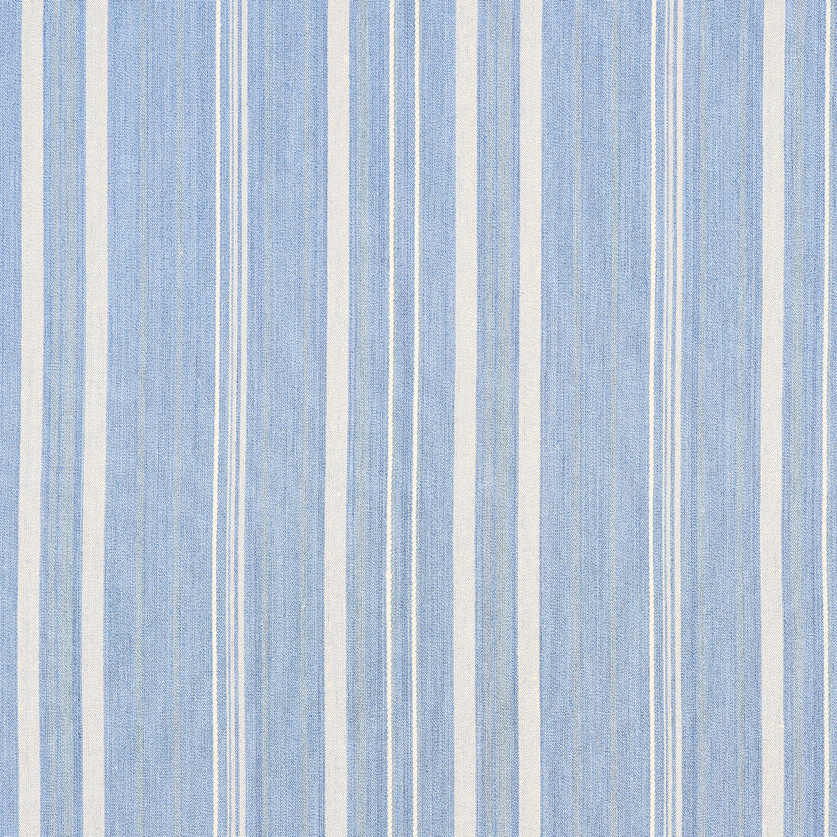 Blue and white vertical striped fabric with alternating light blue and white stripes, woven texture.