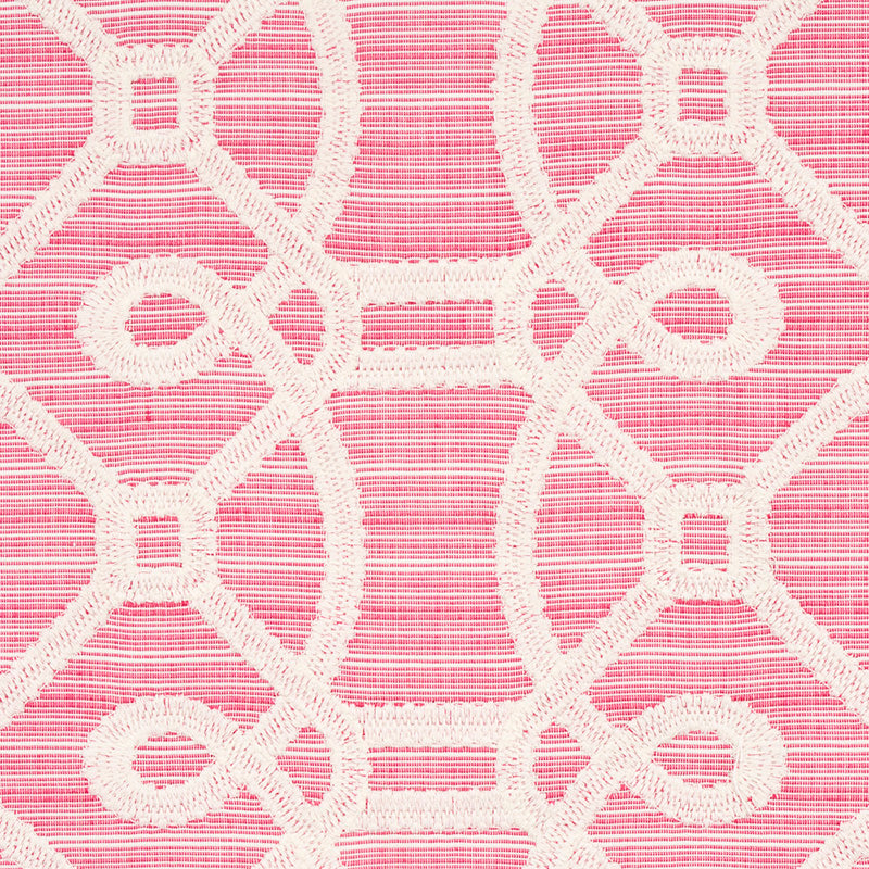 Pink fabric with white embroidered geometric lattice pattern of loops and square shapes.