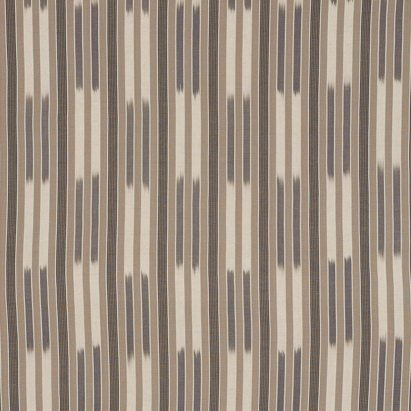 Ikat-inspired striped fabric with beige cream base and vertical navy brush-stroke stripes; versatile upholstery textile.