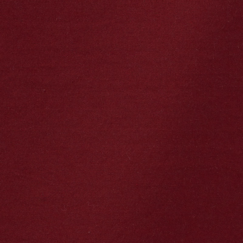 Deep burgundy fabric close-up with a smooth, even weave and rich color.
