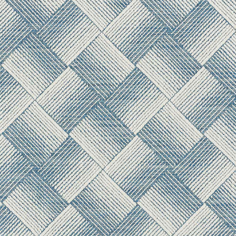Blue and white woven fabric with diagonal ribbed squares forming a geometric diamond pattern.