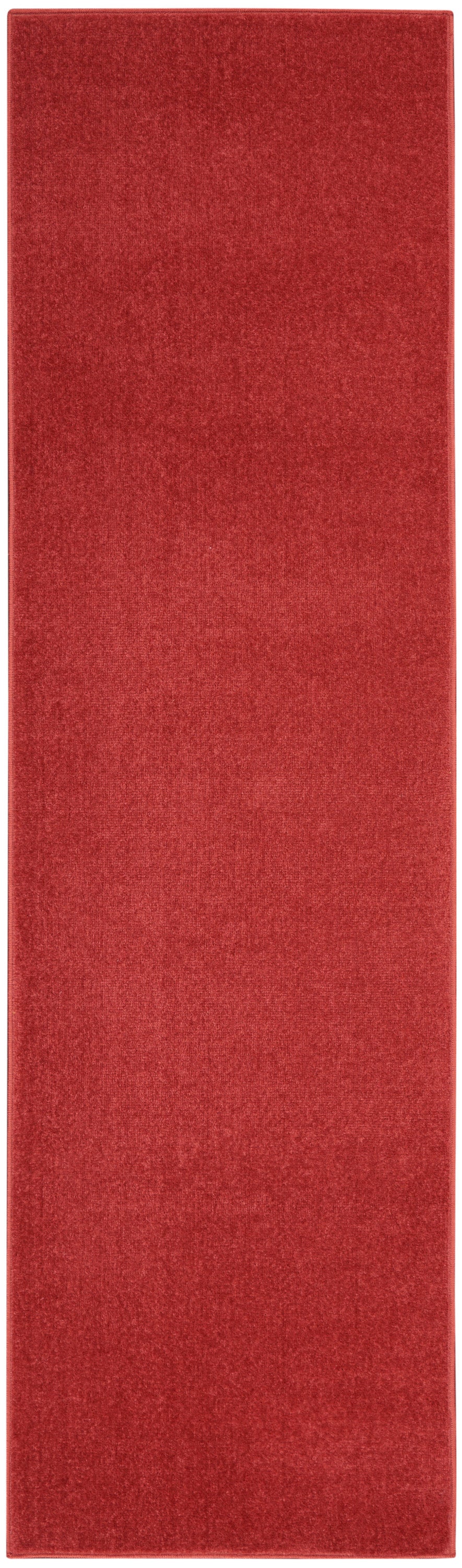 Red rectangular hallway rug runner with plush velvet-like pile.