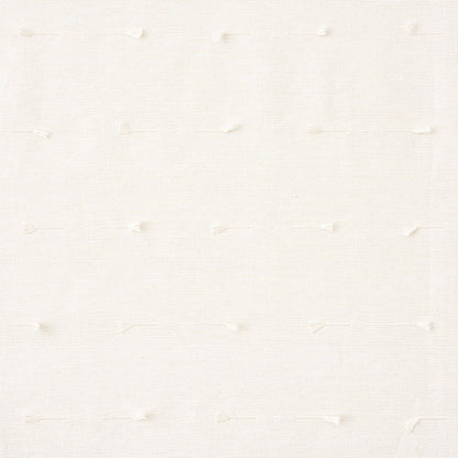 Cream woven fabric with subtle raised dots in a grid pattern; soft texture for upholstery or drapery.