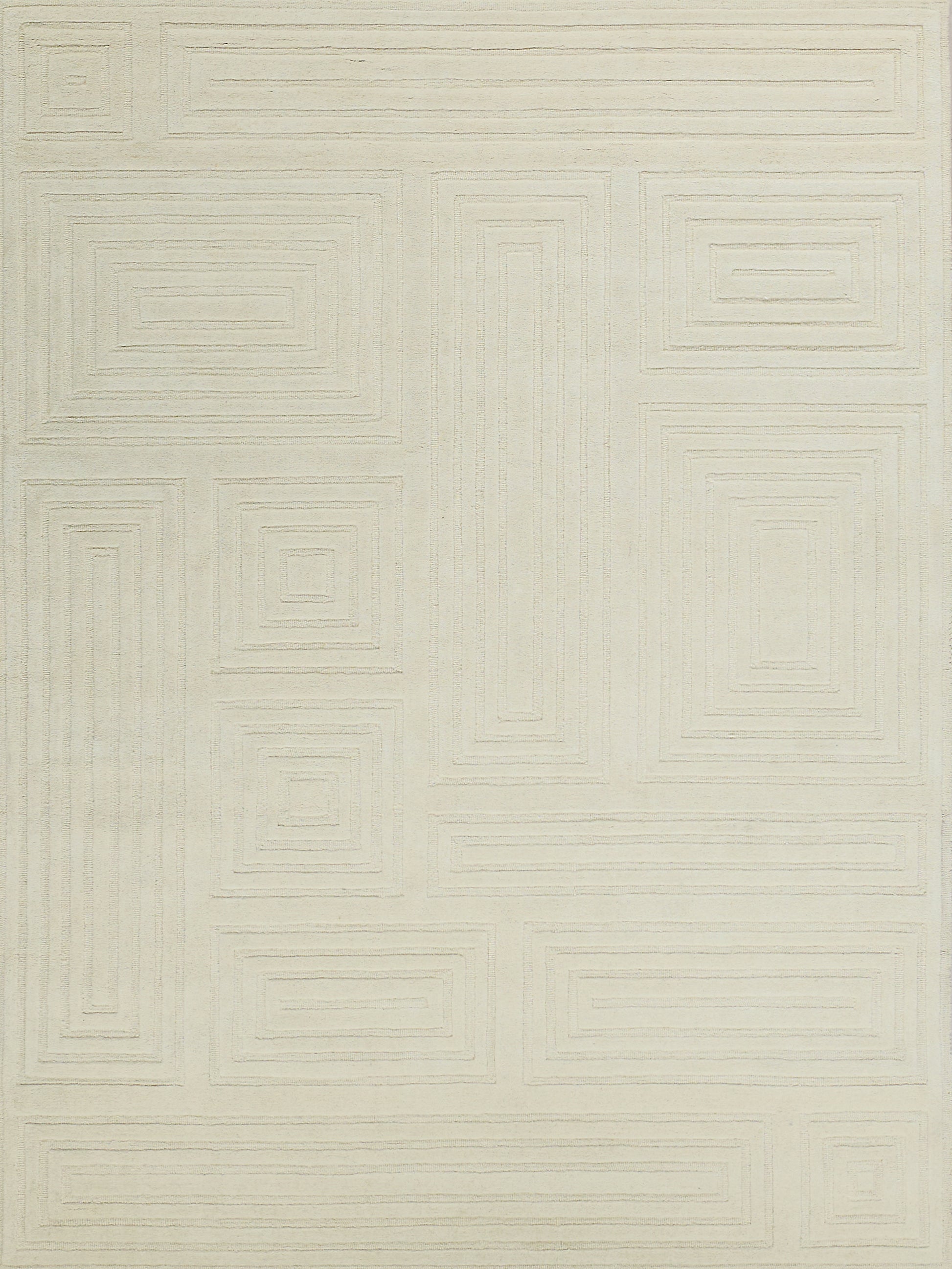 Cream rug with a subtle raised geometric pattern of nested rectangles; modern, neutral decor.