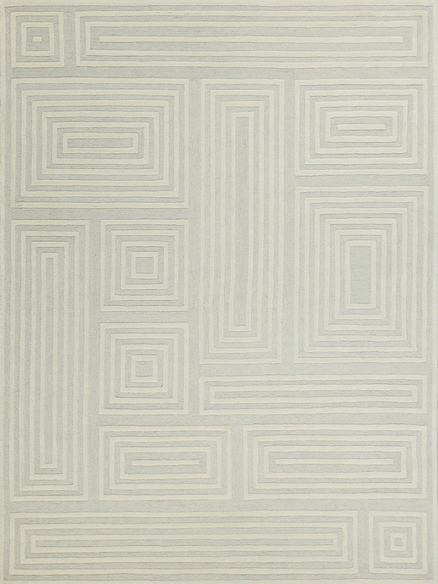 Light beige rug with pale gray concentric squares and rectangles forming a modern geometric maze.