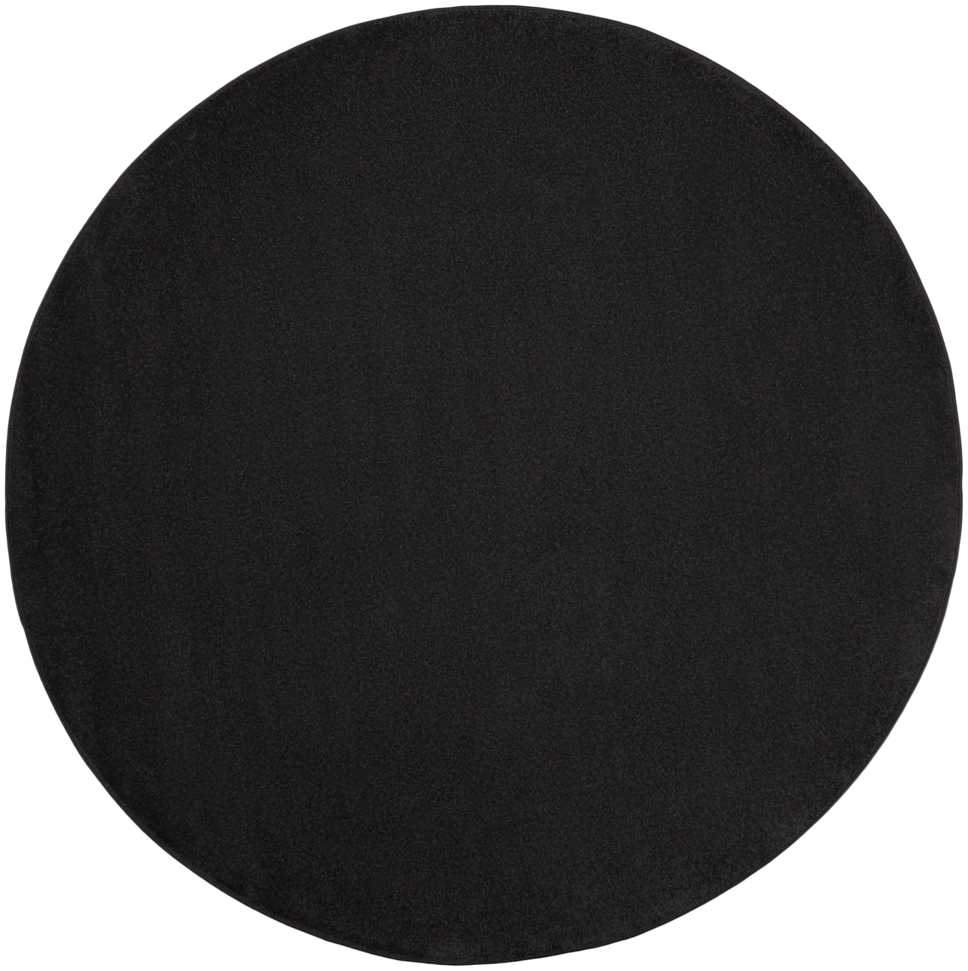 Round outdoor rug with a textured surface; ideal for patio or deck, 6 ft diameter.