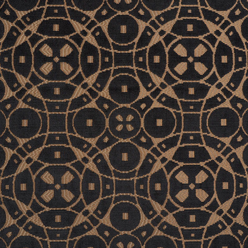 Dark navy upholstery fabric with a tan geometric circular lattice pattern; woven textile.