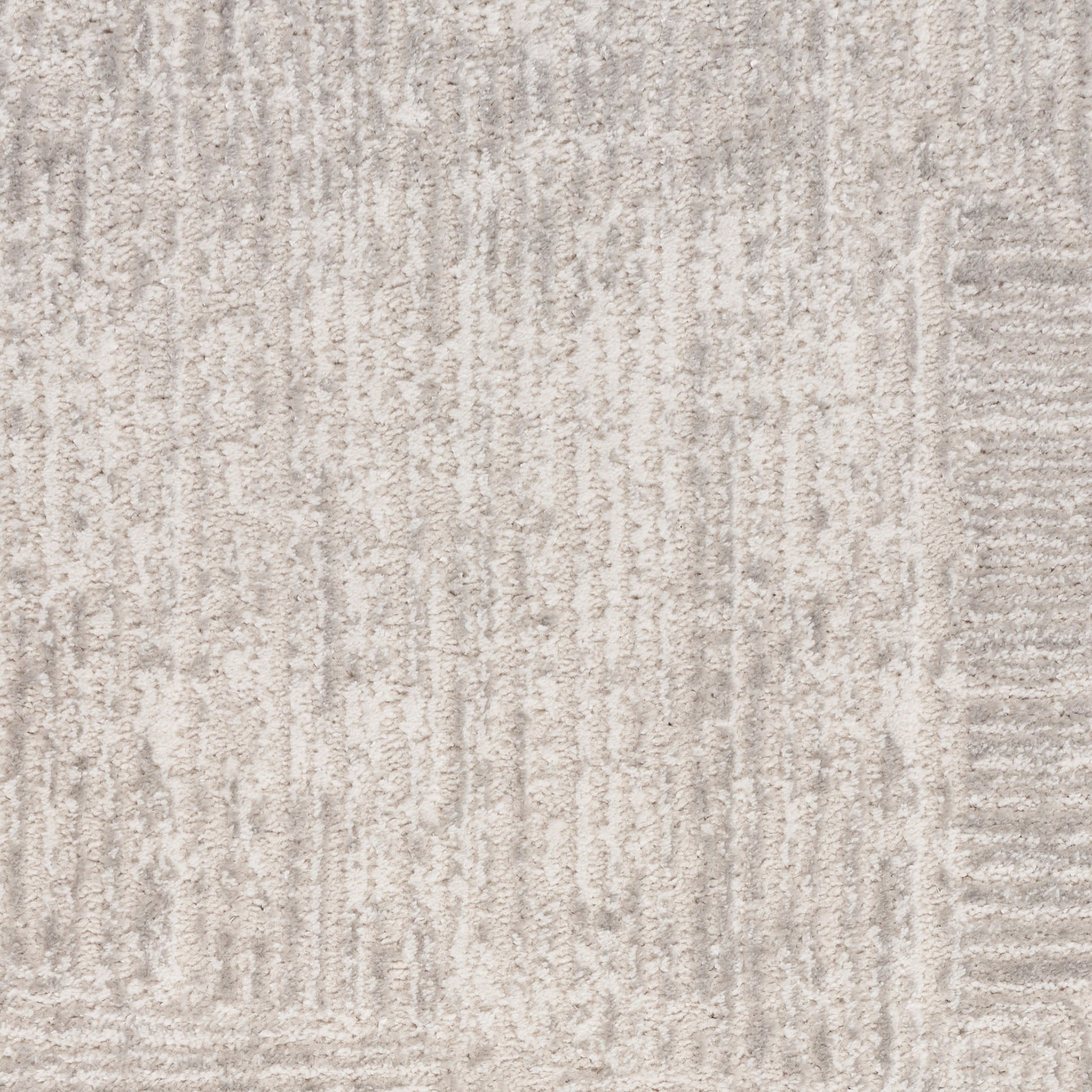 Beige & gray textured rug with subtle vertical stripe pattern and soft, looped pile.