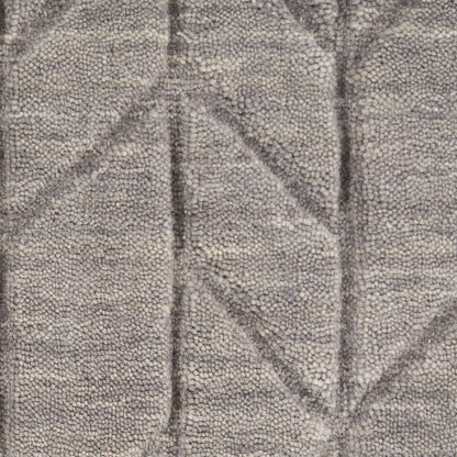 Gray textured rug with geometric diamond pattern and plush looped pile