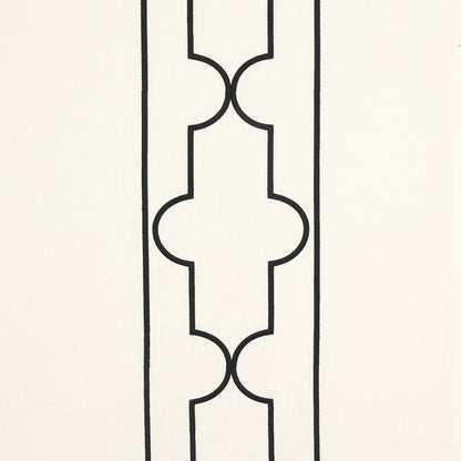 Cream background with a black lattice embroidery pattern of interlocking curved motifs.