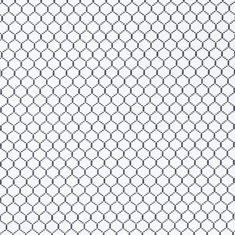 Dark navy dotted mesh fabric with hexagonal honeycomb lattice of small circles; lightweight curtain or screen textile.