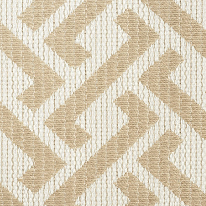 Beige and cream woven fabric with a bold geometric chevron/maze pattern and ribbed texture.