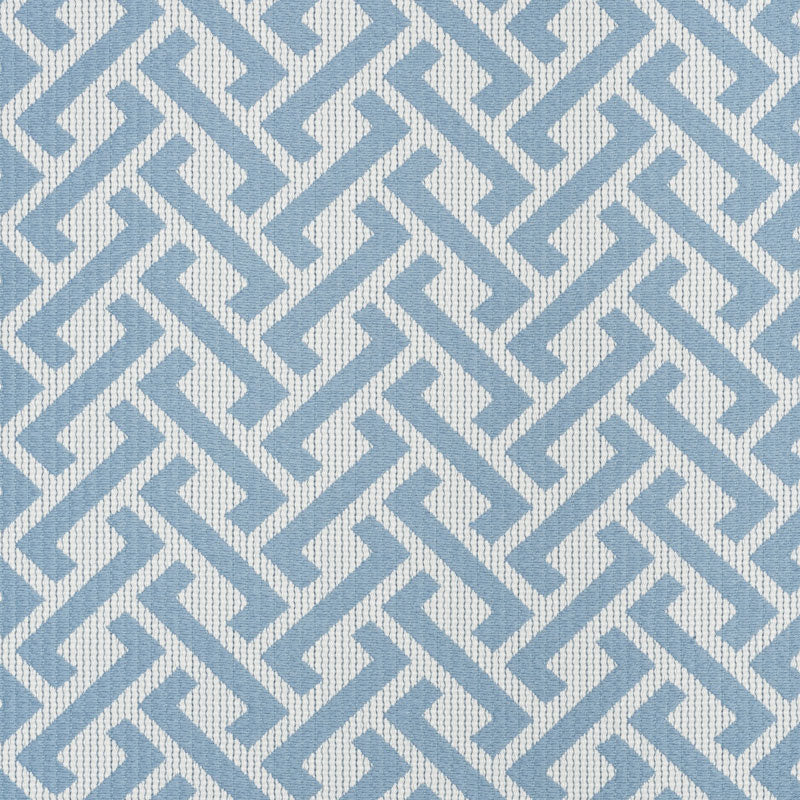 Blue interlocking zigzag border on left with a solid light blue central panel; modern stationery cover.