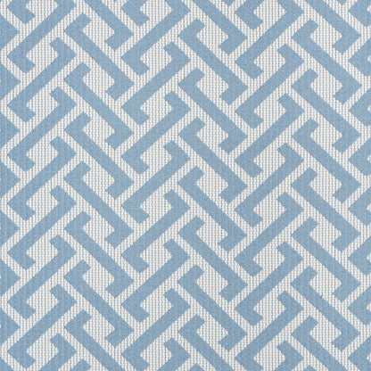 Blue interlocking zigzag border on left with a solid light blue central panel; modern stationery cover.