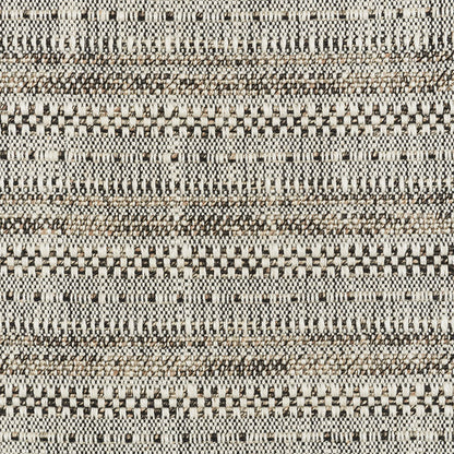 Beige, black & cream woven textile with geometric stripes & checker patterns; rustic rug or upholstery fabric.