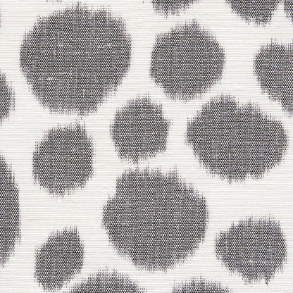 Grey leopard print pattern on wallpaper; irregular round spots with fuzzy edges on a light background.