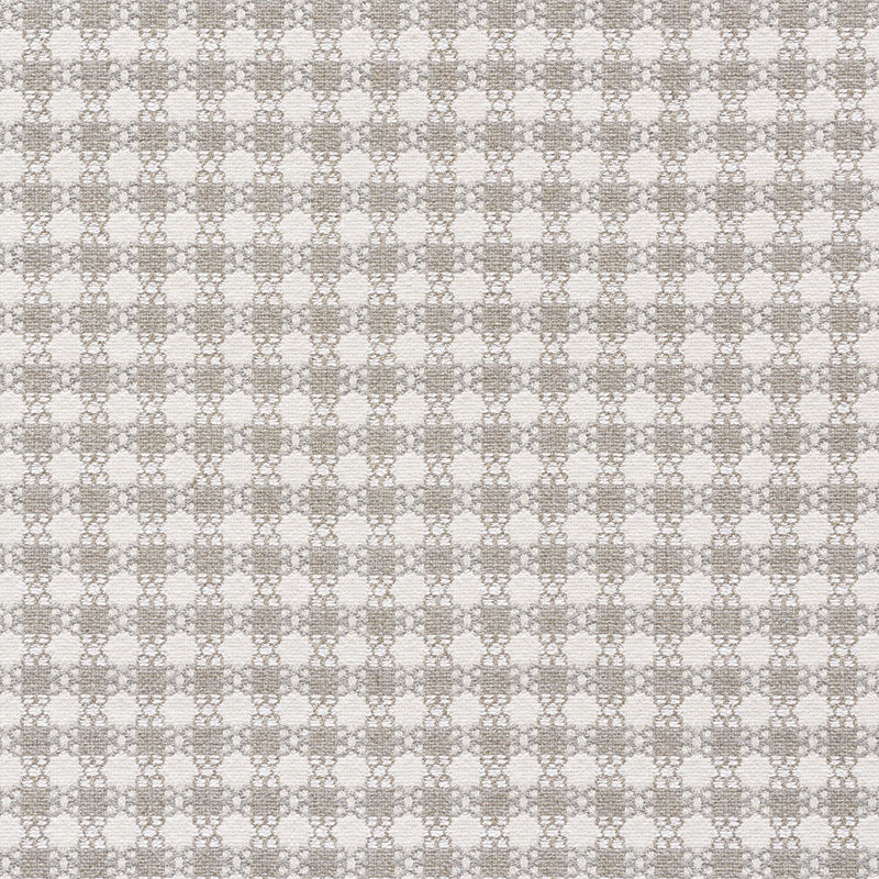 Gray and white woven fabric pattern with small circular lattice motifs in a grid.