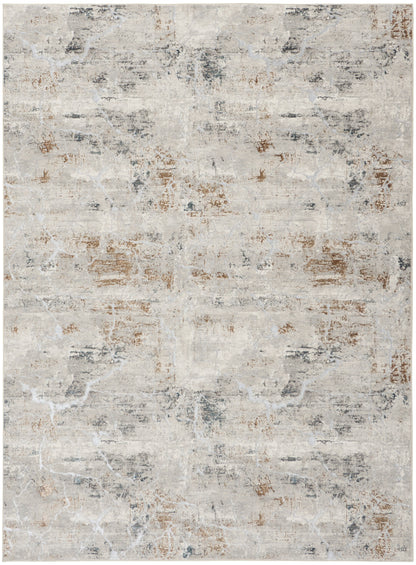 Distressed abstract beige and gray area rug with subtle brown patches, vintage-modern style.
