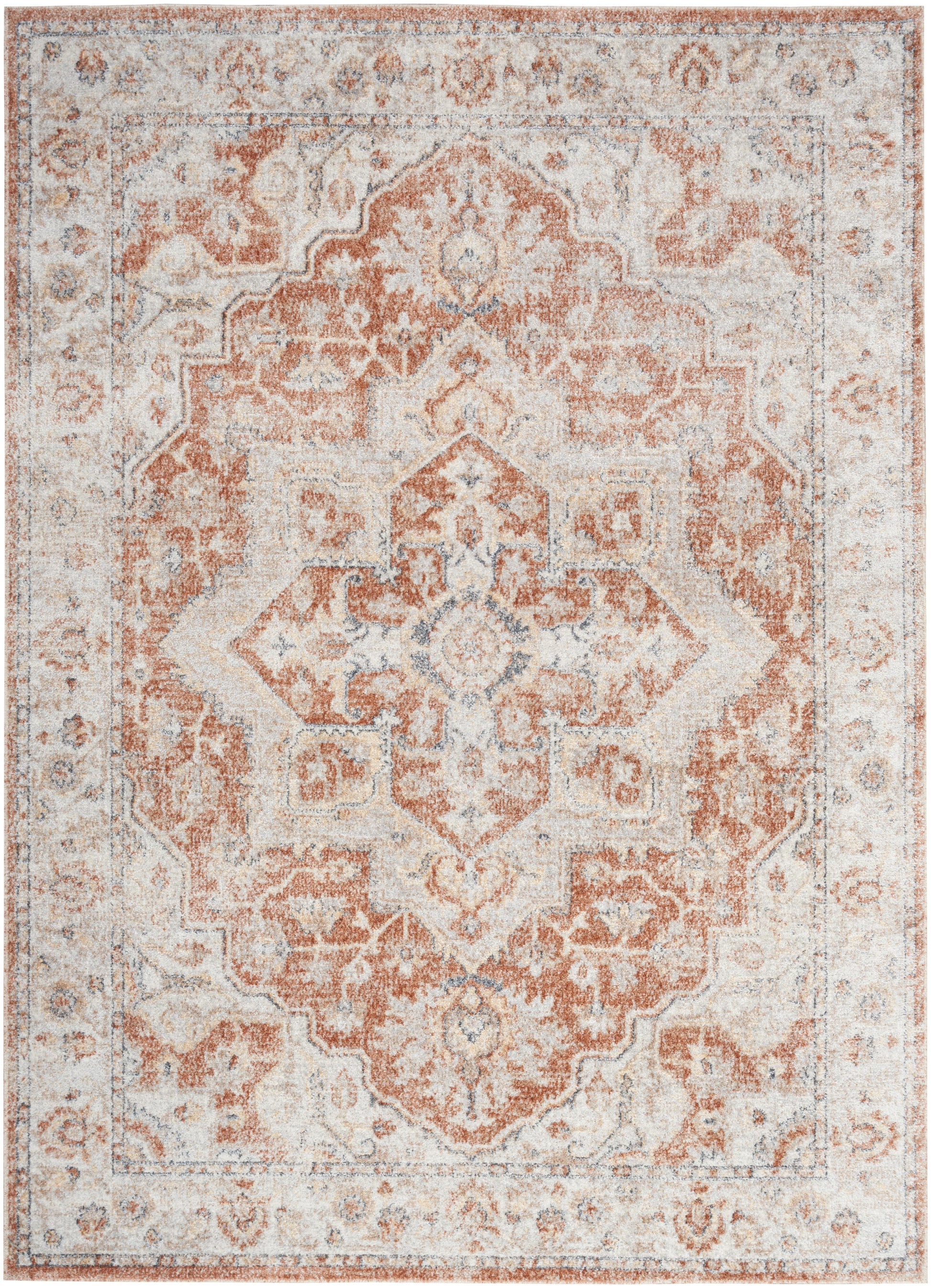 Rectangular distressed oriental rug with a peach and ivory central medallion, pale blue accents and an ornate border.