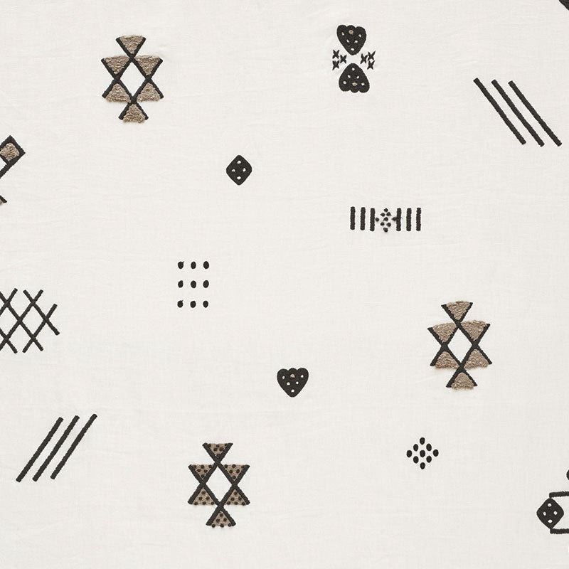 White sheer with black embroidery featuring triangle-star motifs, striped bars, dotted grids and small hearts.
