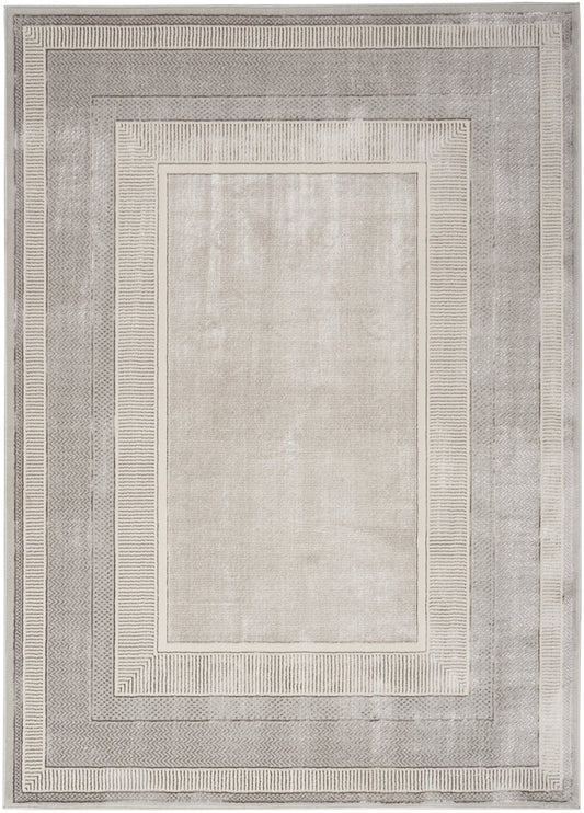 Rectangular 5' x 7' area rug in light beige and gray with layered geometric borders for a neutral modern look