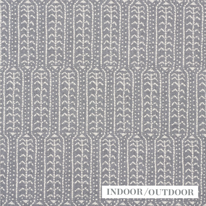 Grey woven indoor/outdoor rug with white vertical leaf-arch motifs in repeating columns.