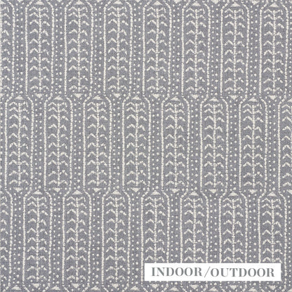 Grey woven indoor/outdoor rug with white vertical leaf-arch motifs in repeating columns.