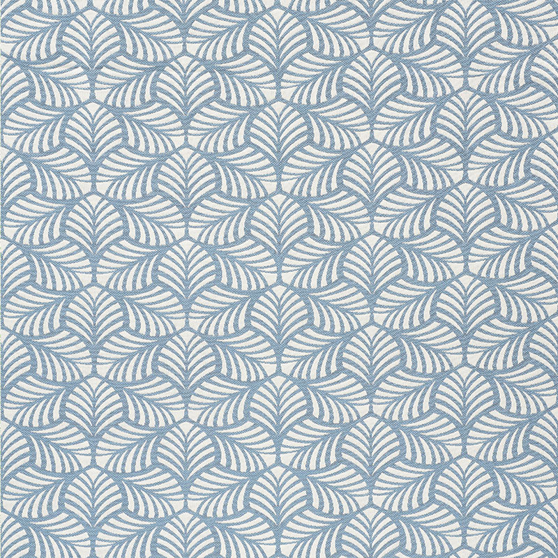 Blue leaf-patterned textile with repeating fan-shaped tropical motifs in a light background.