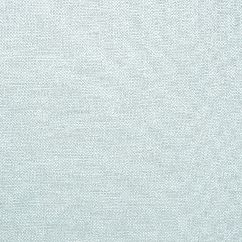 Close-up of pale blue-gray indoor/outdoor woven fabric with a fine texture.