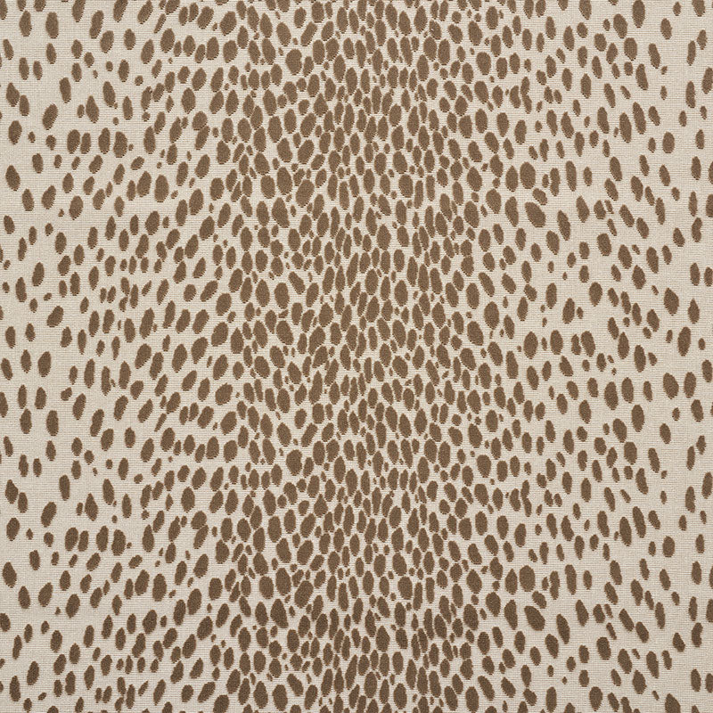 Beige cheetah print pattern with irregular brown spots on a tan background.