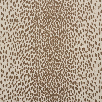Beige cheetah print pattern with irregular brown spots on a tan background.