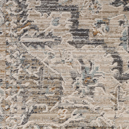 Distressed beige and gray oriental rug close-up with blue and rust accents, vintage pattern, soft pile texture.