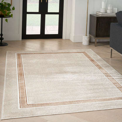 Rectangular beige area rug with a double brown border in a modern living room.