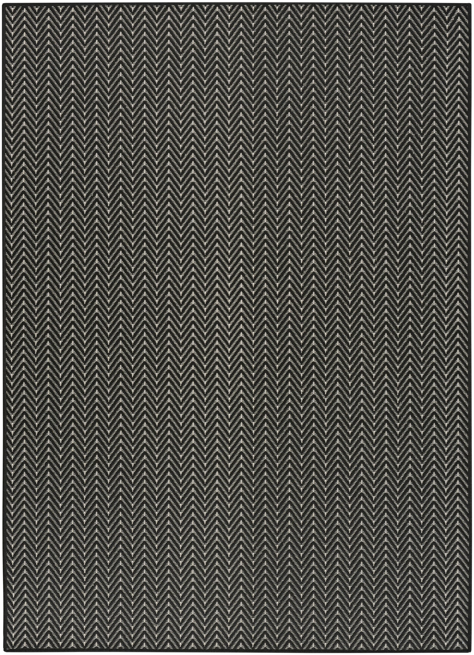 Rectangular rug in charcoal black with cream chevron zigzag pattern; modern geometric woven floor covering.
