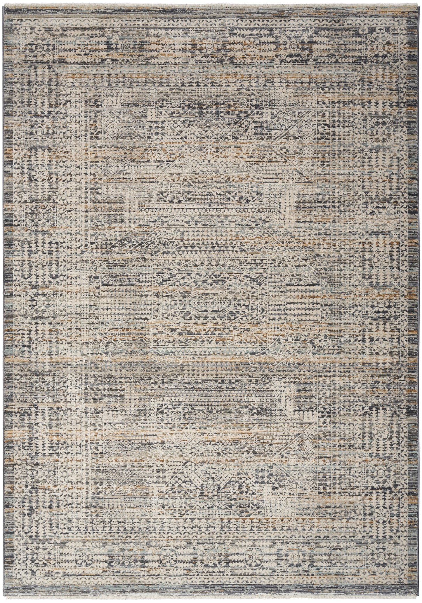 Distressed vintage-style area rug in gray, navy, and beige with a faded geometric medallion pattern and ornate border.