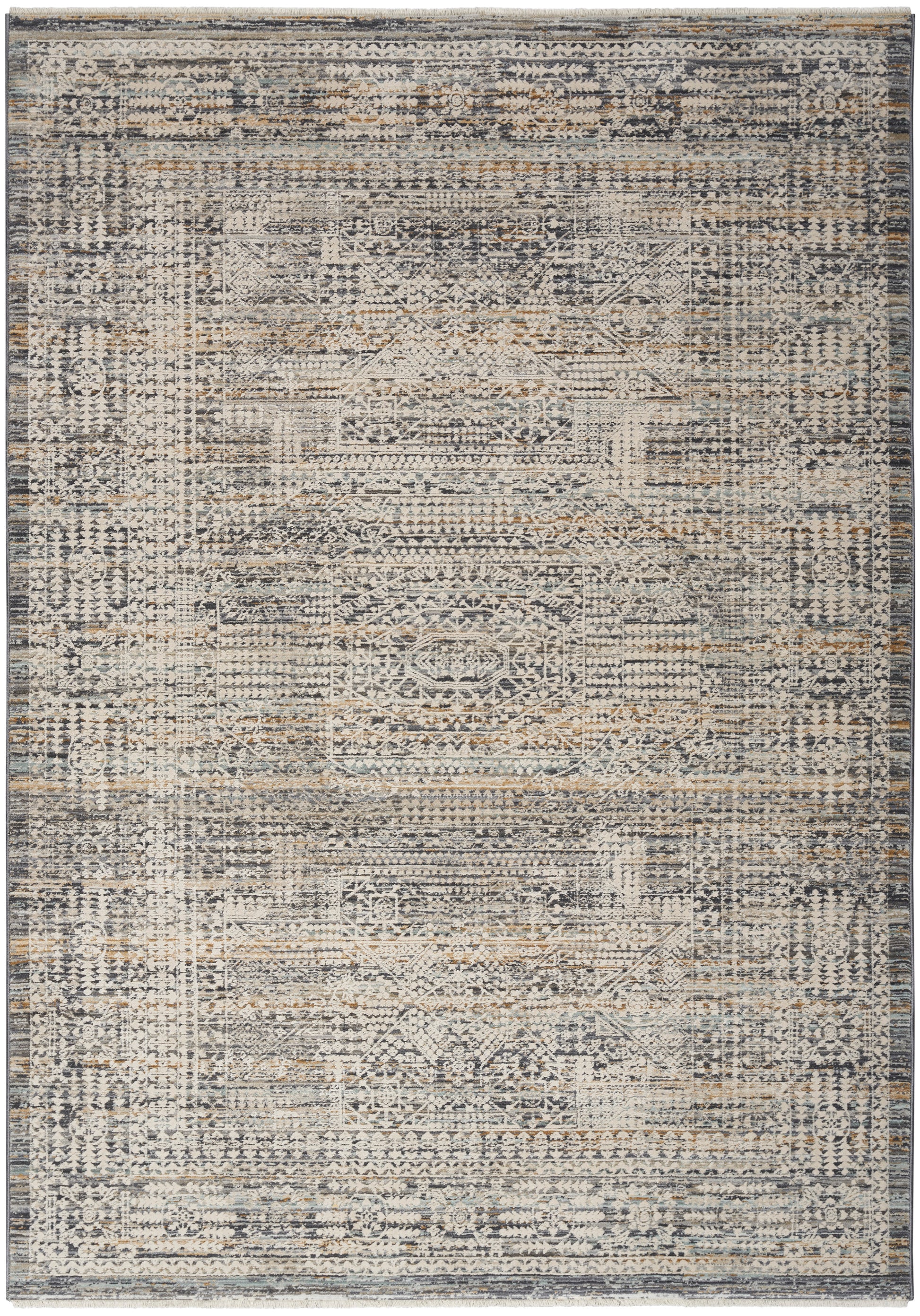 Distressed vintage-style area rug in gray, navy, and beige with a faded geometric medallion pattern and ornate border.