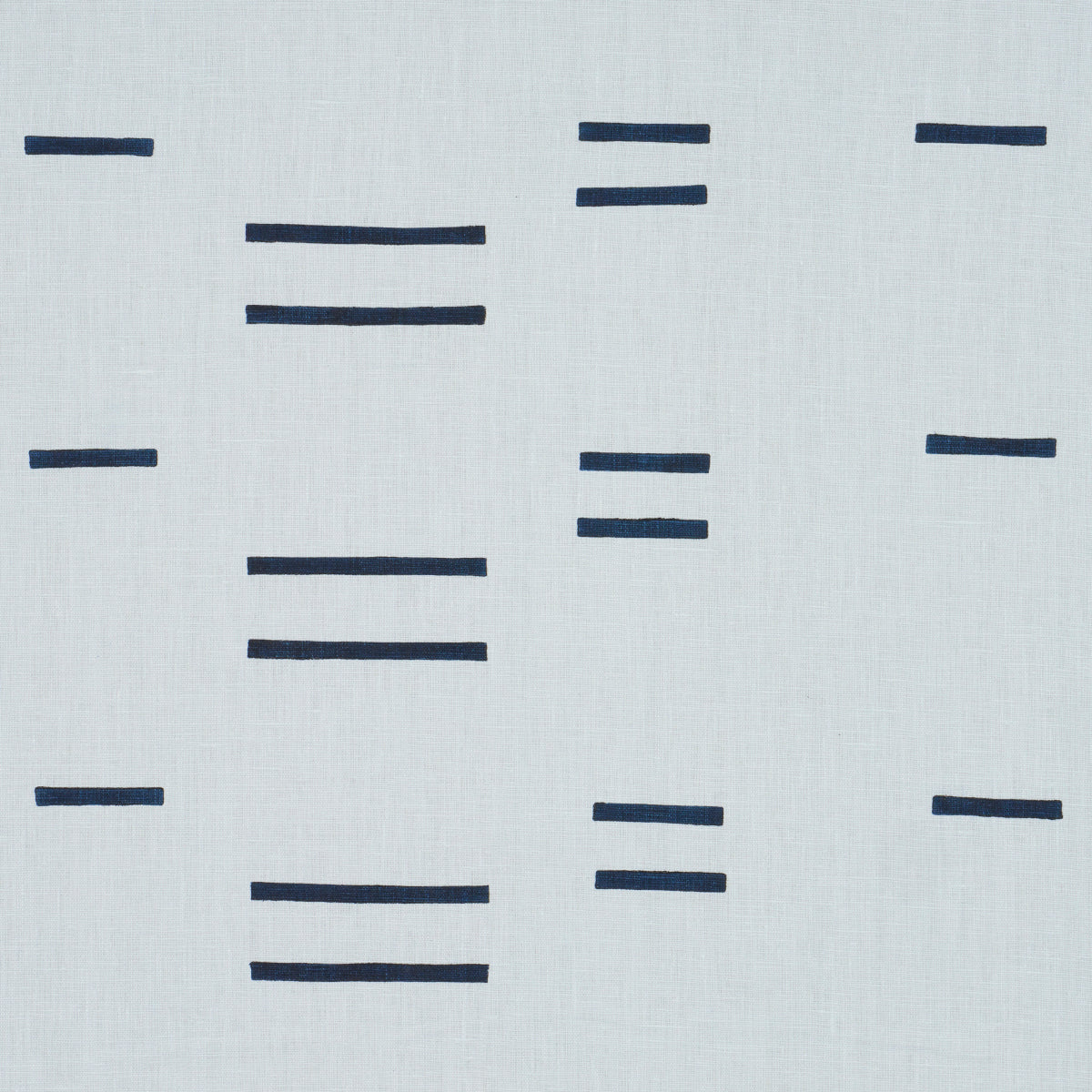 Light blue fabric with scattered navy horizontal dashes; modern geometric textile for cushions or curtains.