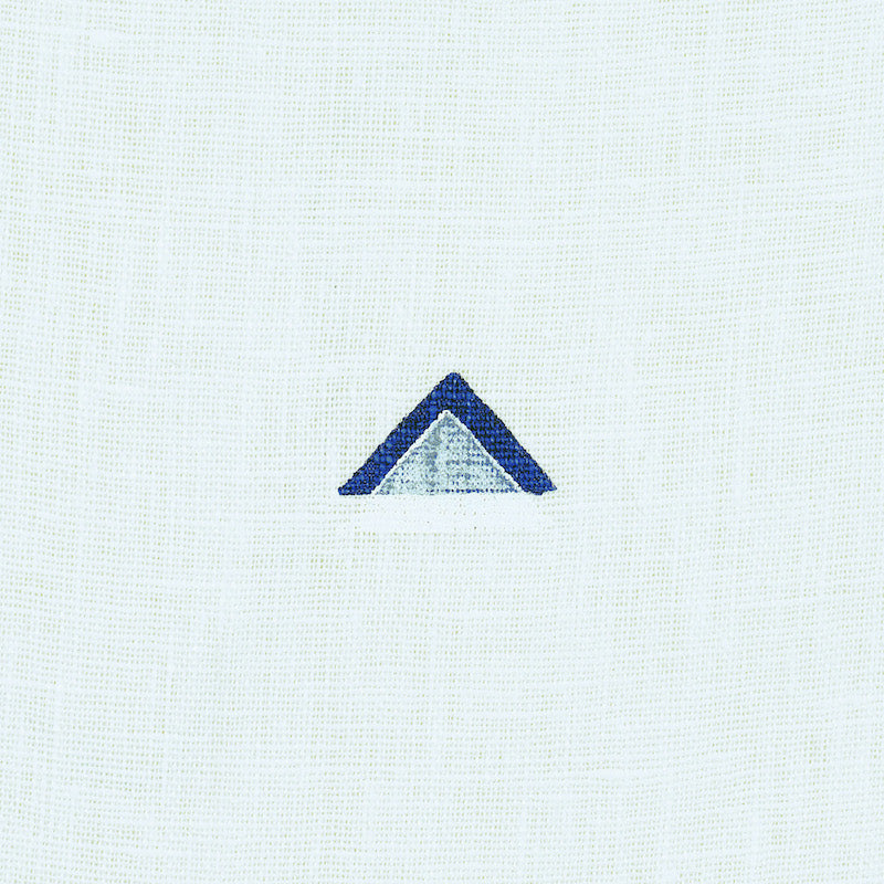 Navy and white overlapping triangle pattern on woven fabric.