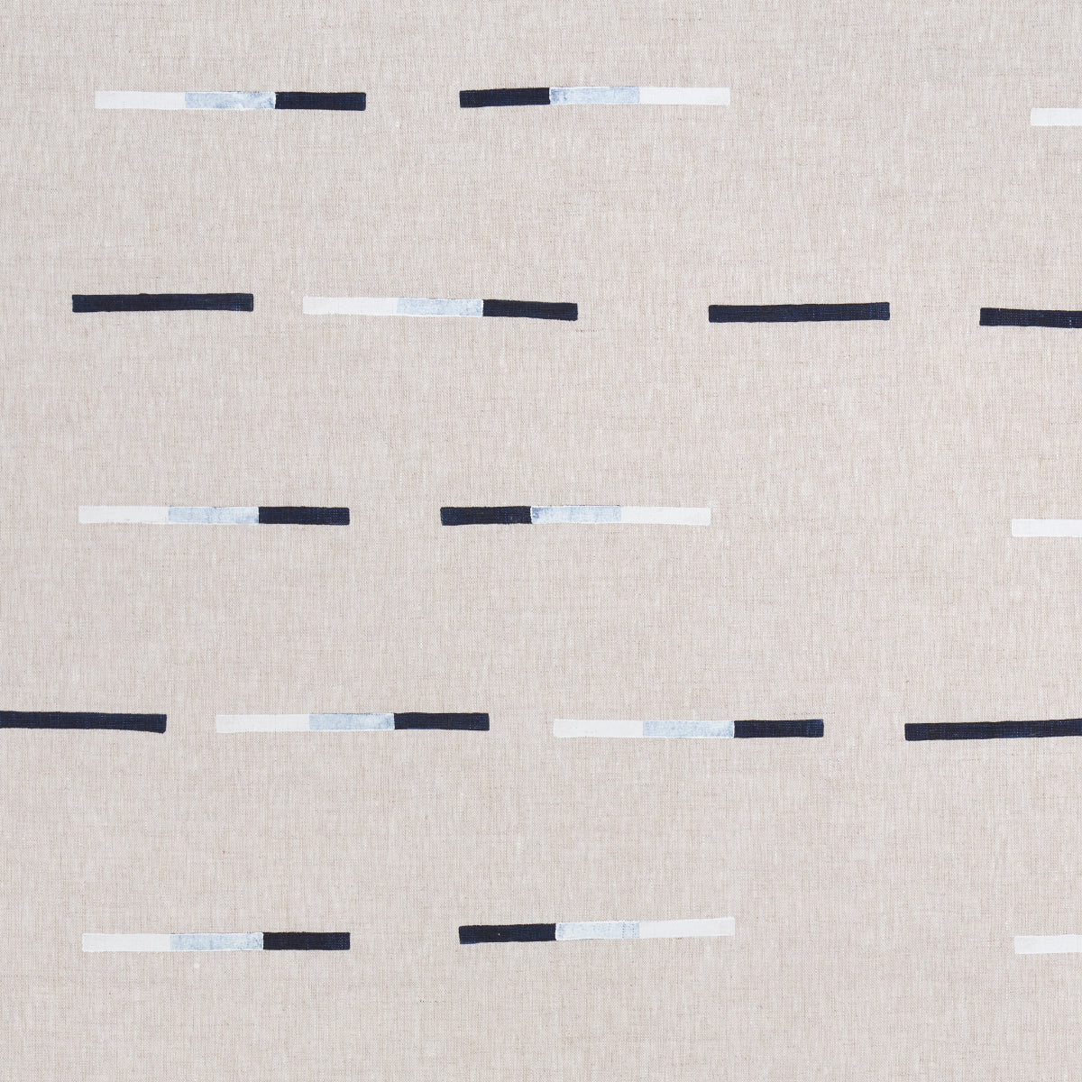 Beige linen-like fabric with overlapping navy, white and light blue dash motifs for a modern minimalist look.