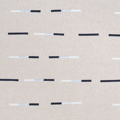 Beige linen-like fabric with overlapping navy, white and light blue dash motifs for a modern minimalist look.