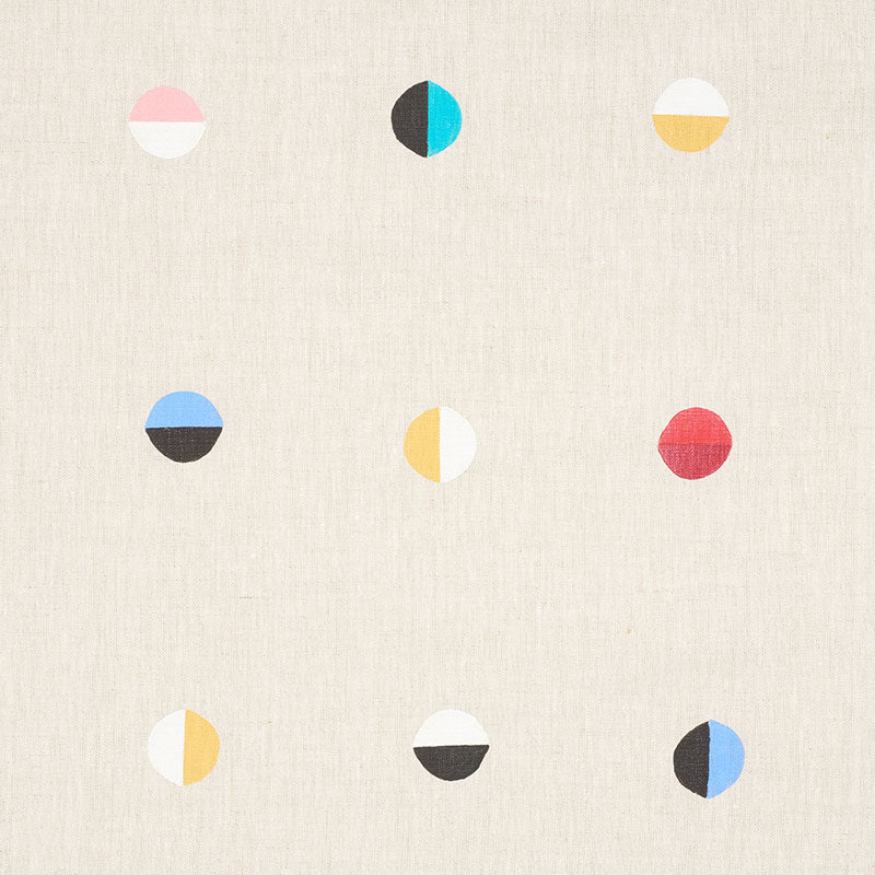 Nine small two-tone circles in a 3x3 grid on textured beige fabric, each circle split into bold color halves.