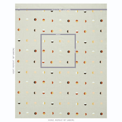 Beige woven textile with Joshua Tree desert moons pattern; lavender centered square frame; orange, brown and white accents; mid-century style.