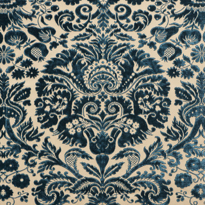 Navy blue damask floral pattern on ivory background; ornate baroque-inspired textile design.