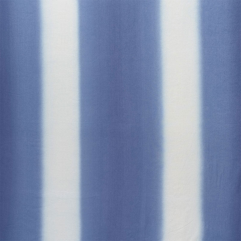 Blue and white fabric with broad brush-stroke print.