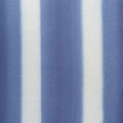 Blue and white fabric with broad brush-stroke print.