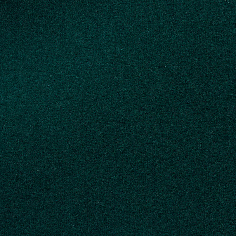 Deep forest green felt fabric close-up; soft matte upholstery material.