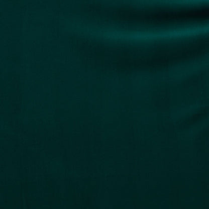Deep green velvet fabric swatch with subtle sheen and soft drape.