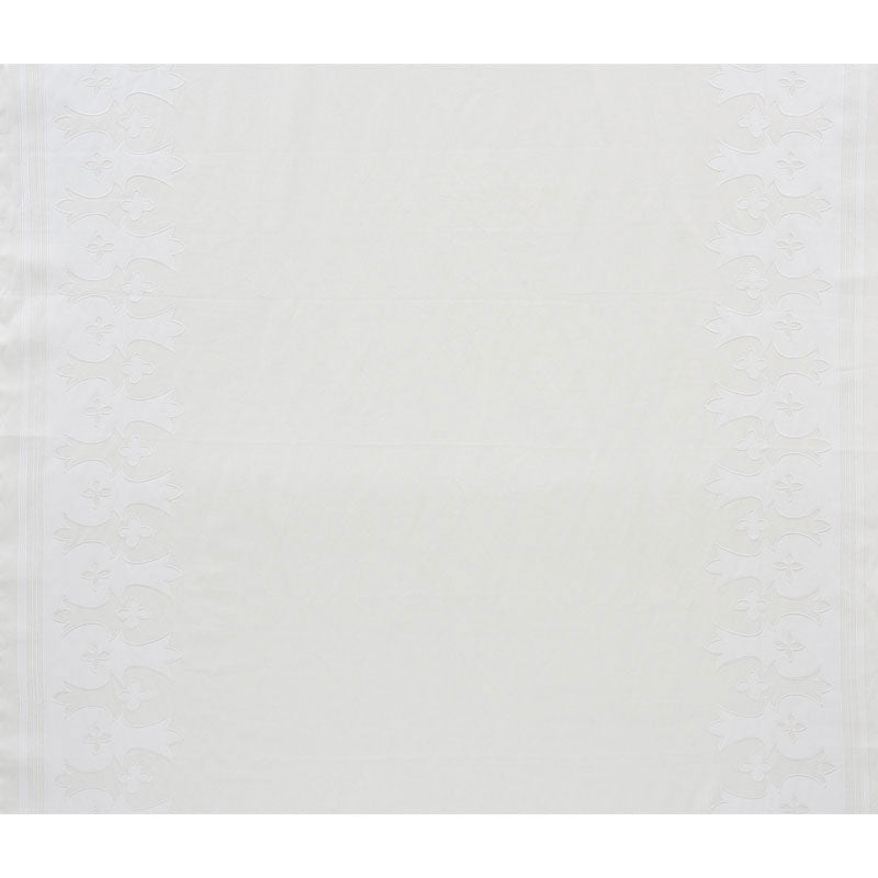 Ivory linen table runner with subtle embossed floral border along the sides.